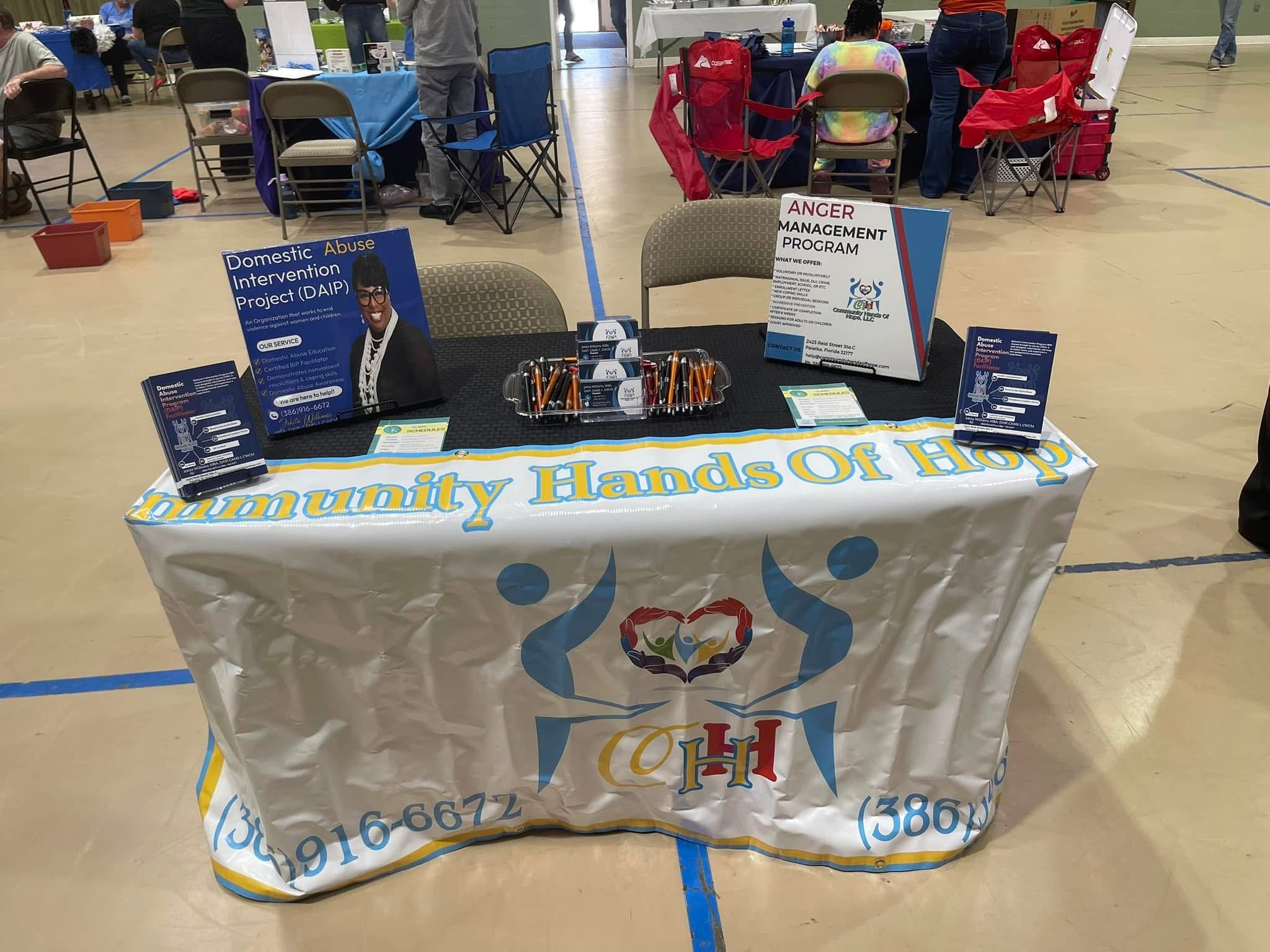 Community Hands of Hope outreach booth at community event